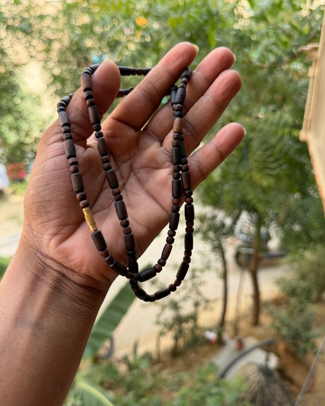 Full design of 2 Round Dark Brown Tulsi Kanthi Mala with smooth natural Tulsi beads