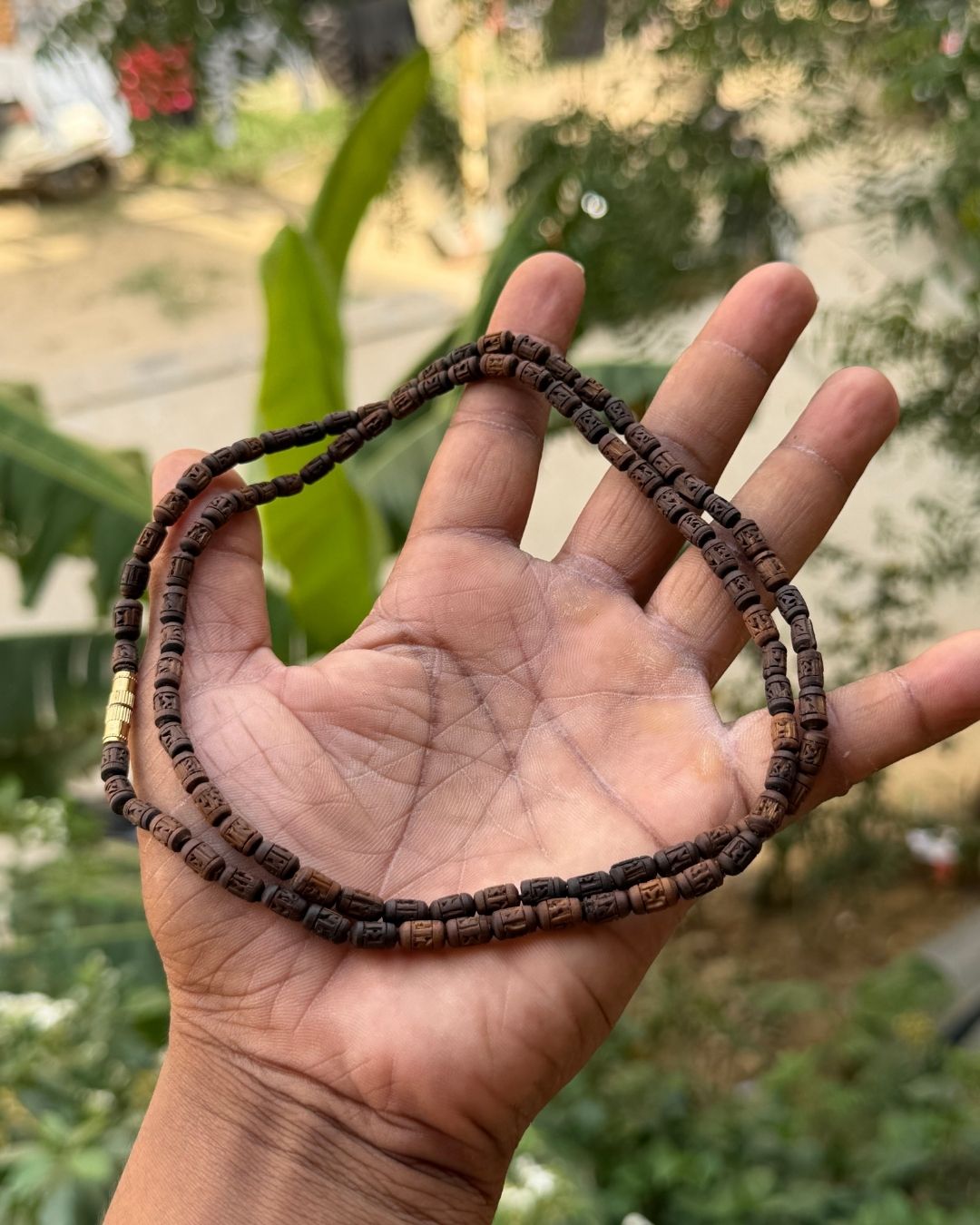 Authentic Radha Name Tulsi Mala crafted from original dark brown Tulsi beads