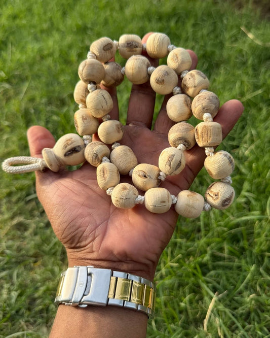 Close-up image of 27+1 Tulsi Beads Japa Mala highlighting the large natural Tulsi wood beads and smooth finish.