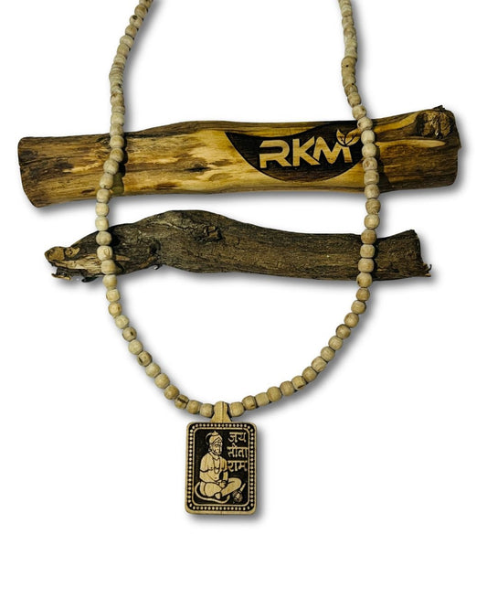 Close up view of Hanuman Ji Locket Tulsi Mala showing detailed pendant and smooth Tulsi beads
