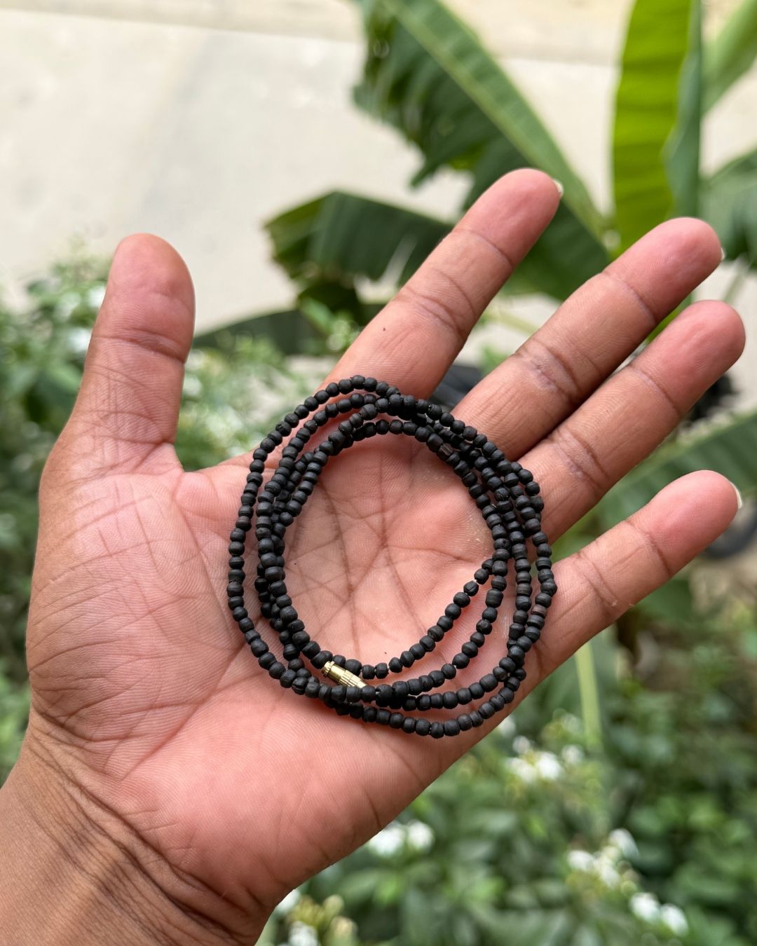 Close-up view of Original Black Tulsi Mala 2 Round with premium natural black Tulsi beads
