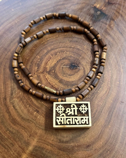 Close up of Sitaram Bhaktamal Tulsi Mala with Dark Brown Beads showing natural Tulsi wood beads