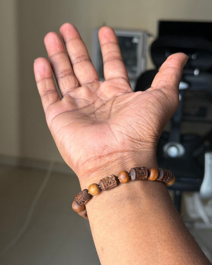 Radha Name Brown Tulsi Bracelet with natural round Tulsi beads front view for daily spiritual wear