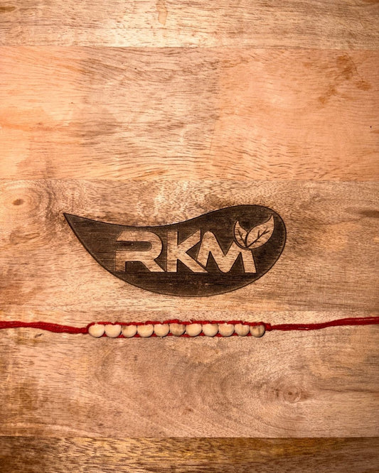 Tulsi Rakhi with Red Thread crafted with original natural Tulsi beads for Raksha Bandhan celebrations and spiritual blessings