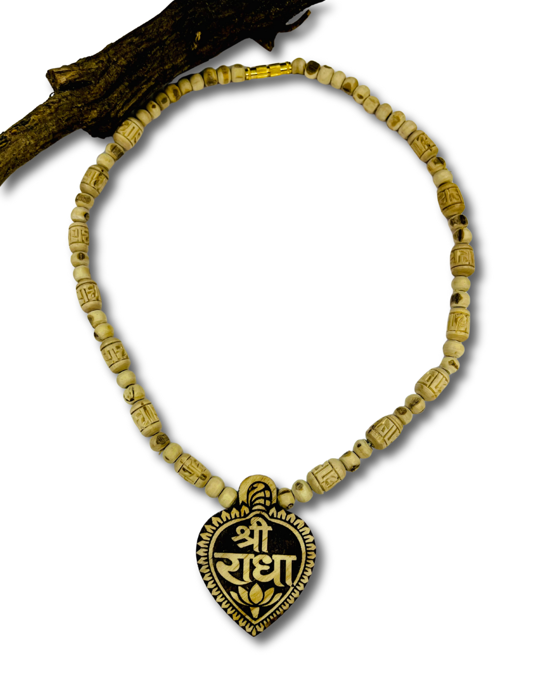 Sacred Locket Close-Up on Tulsi Mala Close-up of locket Tulsi Kanthi Mala showing natural Tulsi beads and detailed sacred locket design