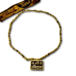 Close up of Haridas Small Bhaktmal locket on mala