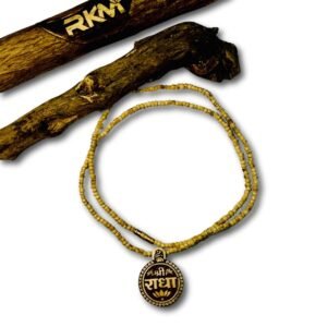 Close up of round locket on Round Locket Tulsi Mala