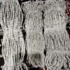Asli Tulsi Mala Ki Pehchan karte hue original Tulsi beads ka natural texture aur shape